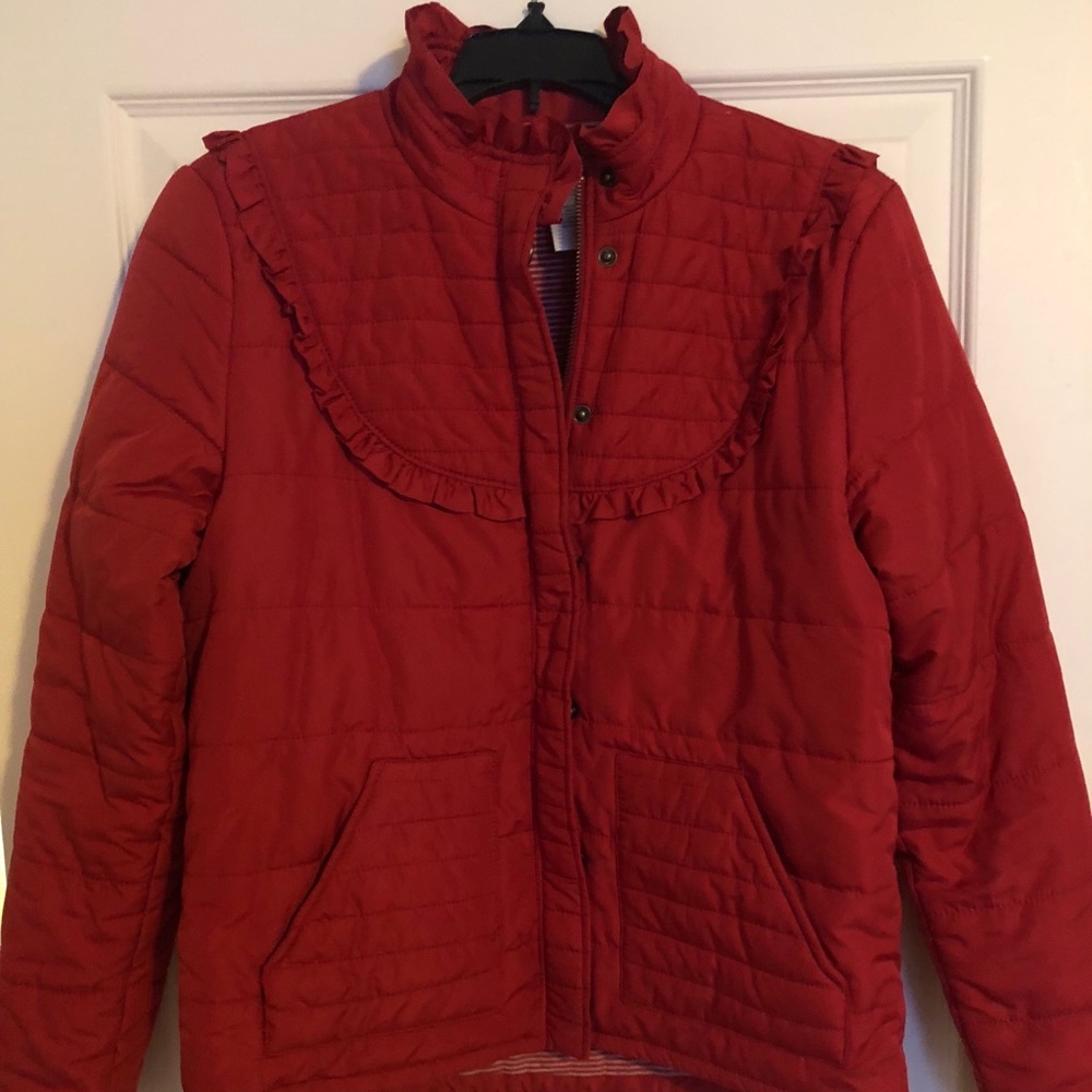 Red puffer coat